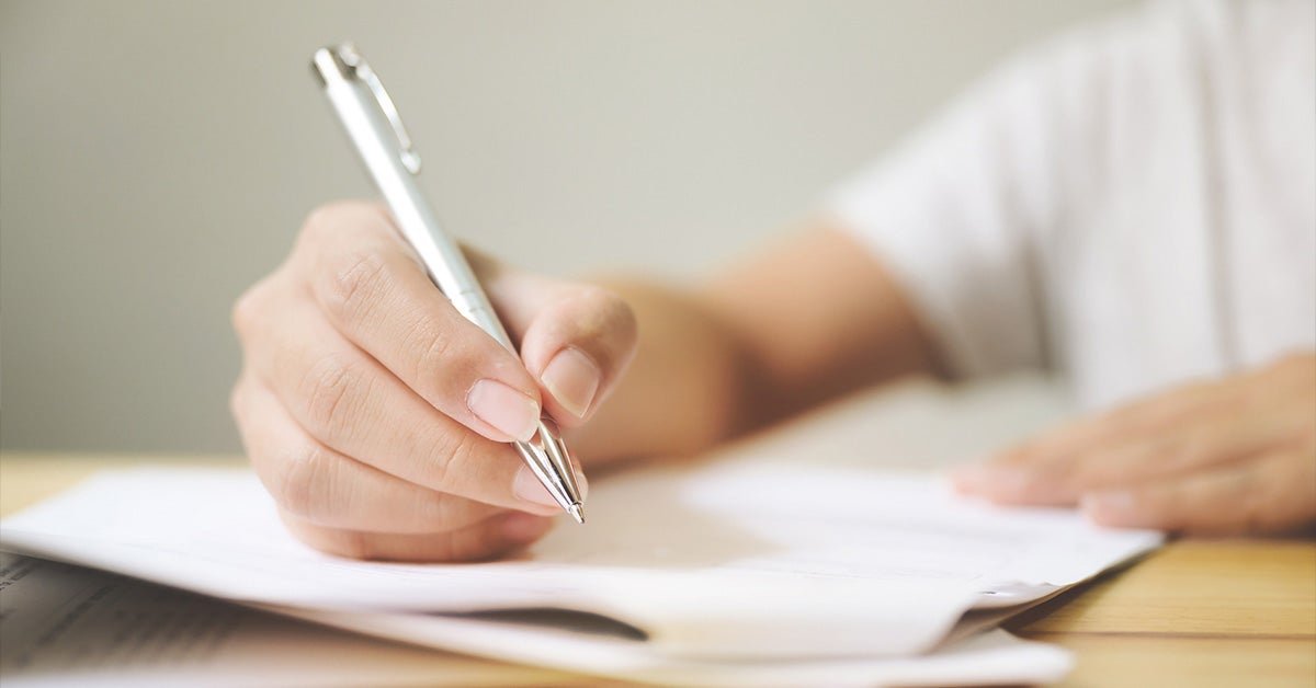 Mazda lease terms explained to customer on paper.